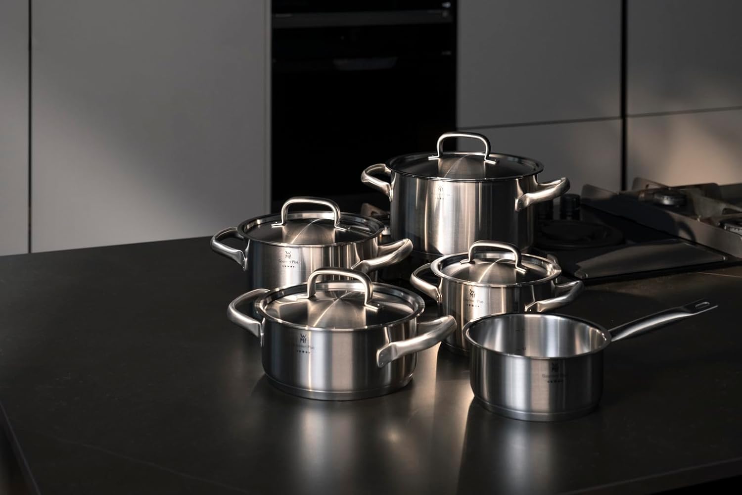 WMF Gourmet Plus - Batería de Cocina 5 Piezas, Acero Inoxidable Apto para Inducción, 1 Cacerola Baja de 20 cm, 3 Cacerolas Altas de 16 cm, 20 cm y 24 cm, 1 Cazo 16 cm con 4 Tapas de Acero Inoxidable